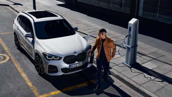 Electric vehicle charging point charging at work BMW e-mobility electric vehicle charging point charging at work