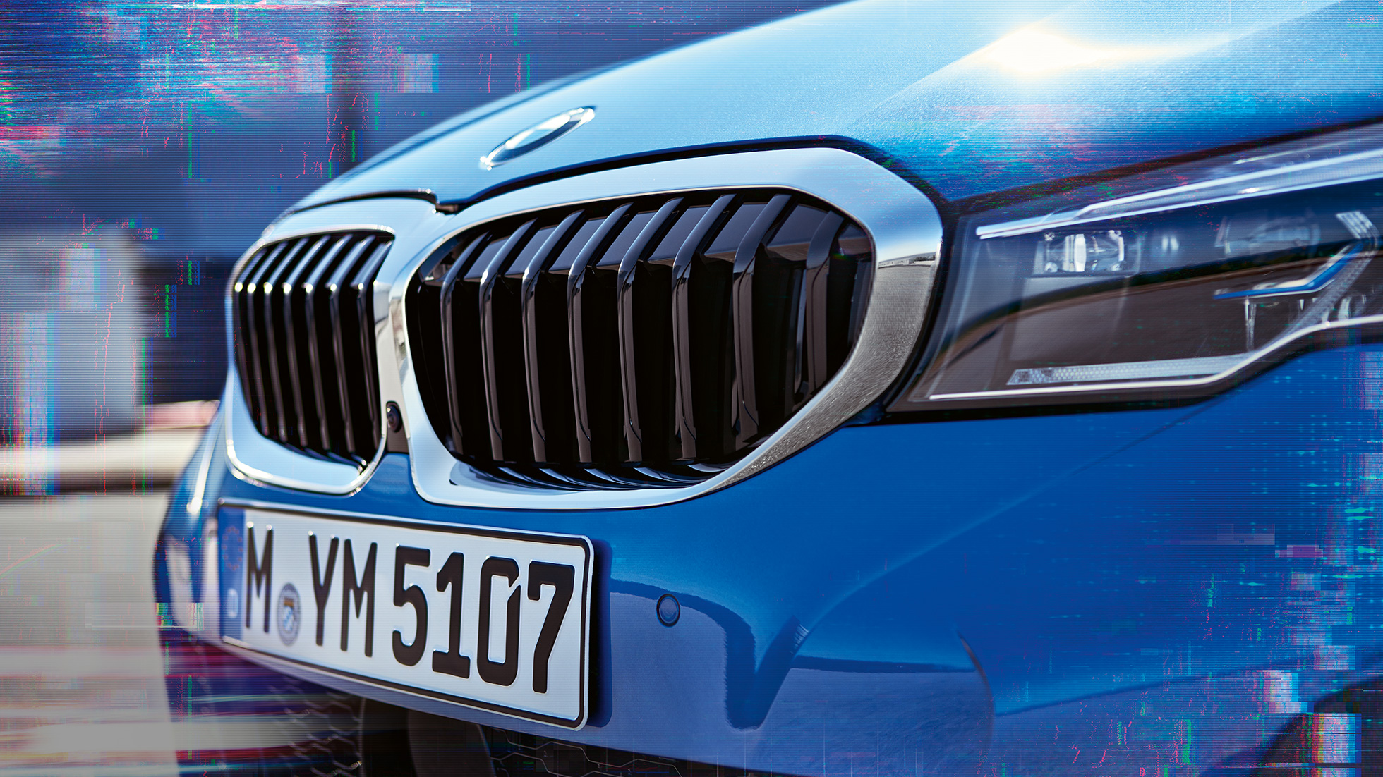 Nyregrillen på BMW 3-serie Sedan. Nærbilde av nyregrillen på BMW 3-serie Sedan sett fra siden.