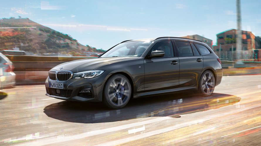 BMW 3-serie Touring, sett fra siden under kjøring