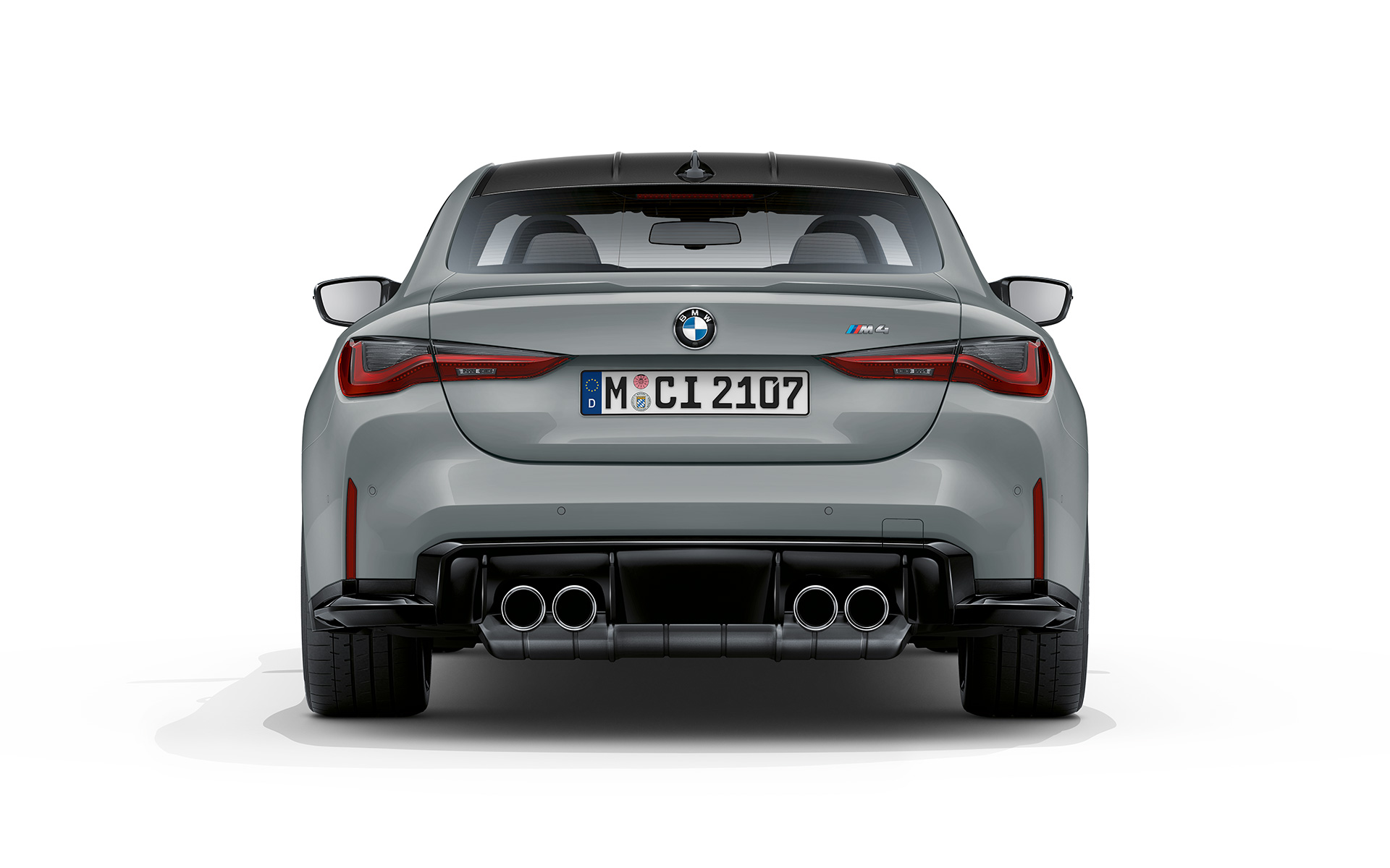 BMW M4 Coupé G82 2020 Brooklyn grå metallic sett bakfra
