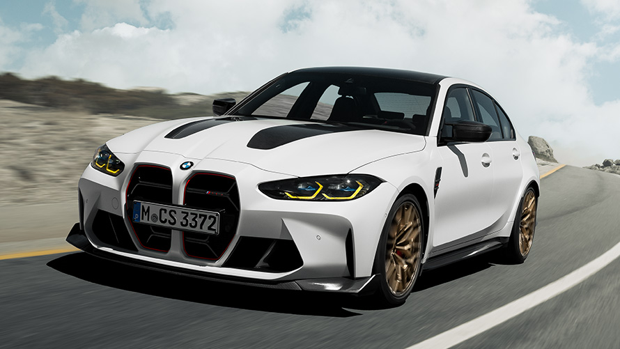 BMW M3 G80 sett forfra kjørende på vei BMW M-modeller BMW M3 G80 sett forfra kjørende på vei