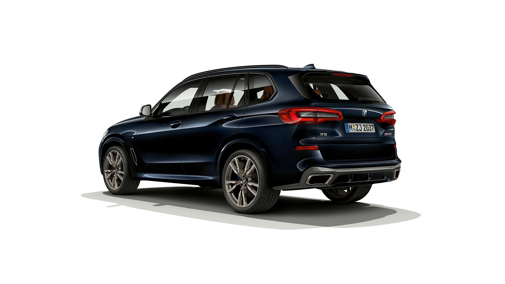 BMW X5 M50d sett bakfra BMW X5 M50d med takspoiler G05 karbonsort metallic sett bakfra