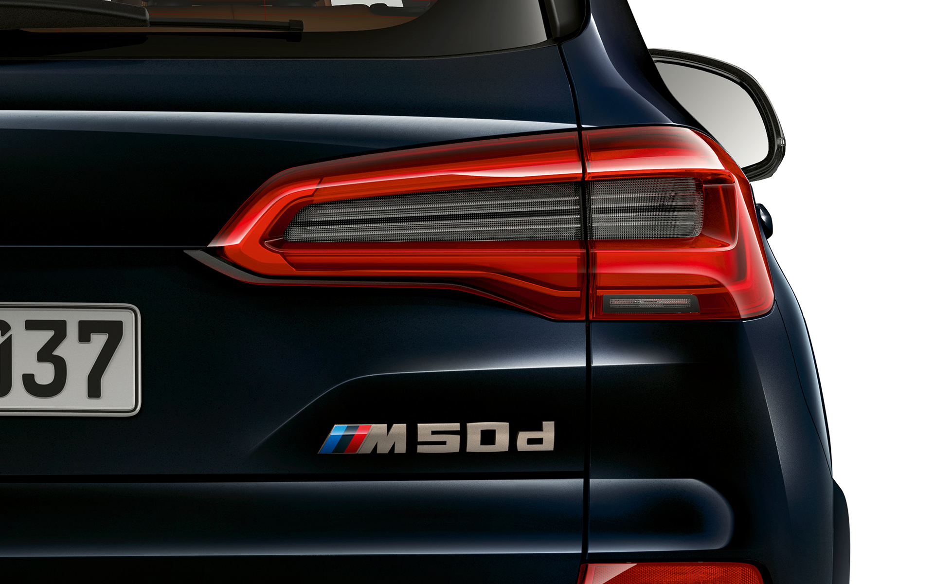 Hekksignatur på BMW X5 M50d Nærbilde av modellogoen på BMW X5 M50d