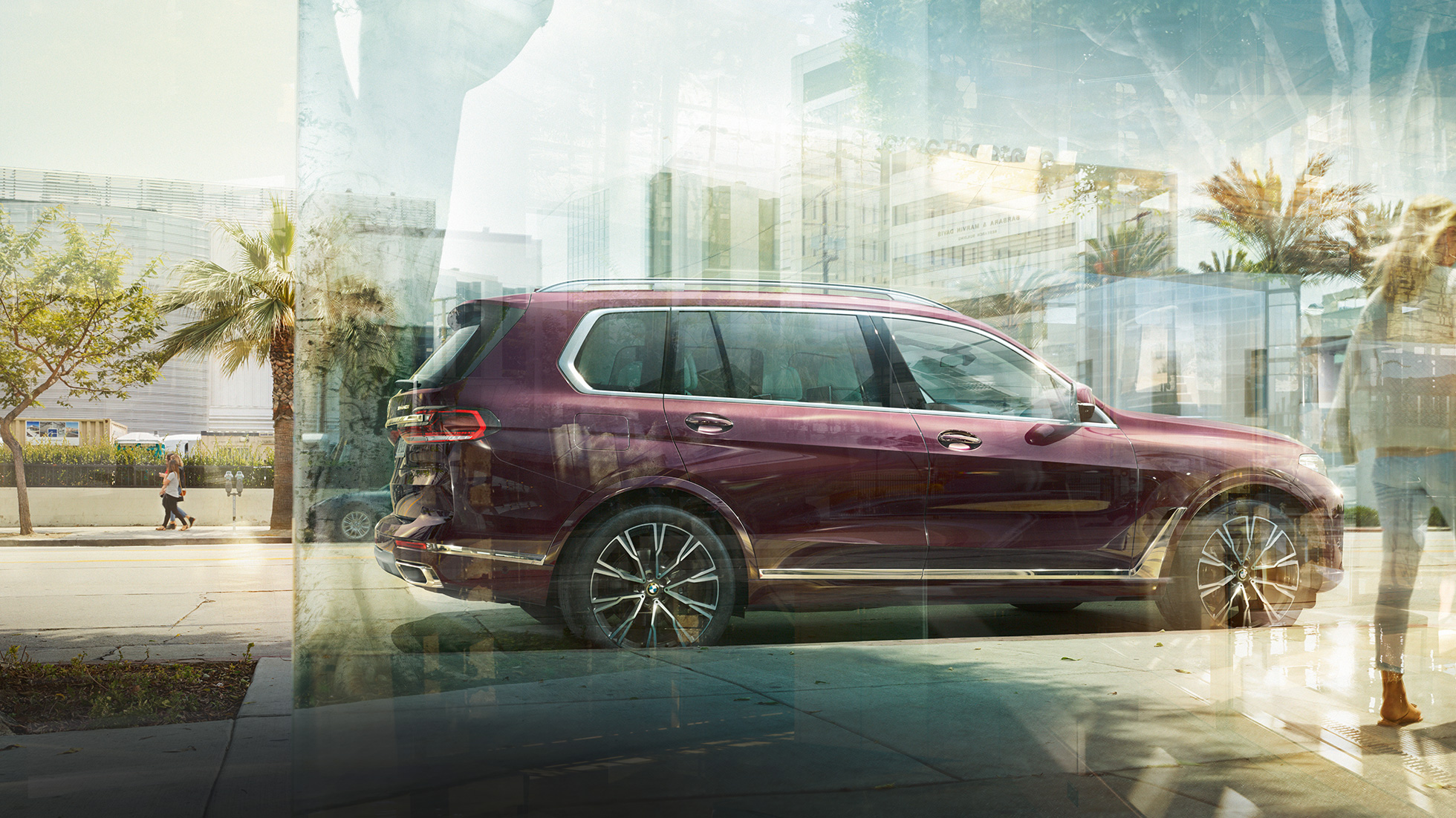 BMW Individual X7 40i xDrive sett fra siden Parkert BMW X7 i ametrin metalliclakk sett fra siden